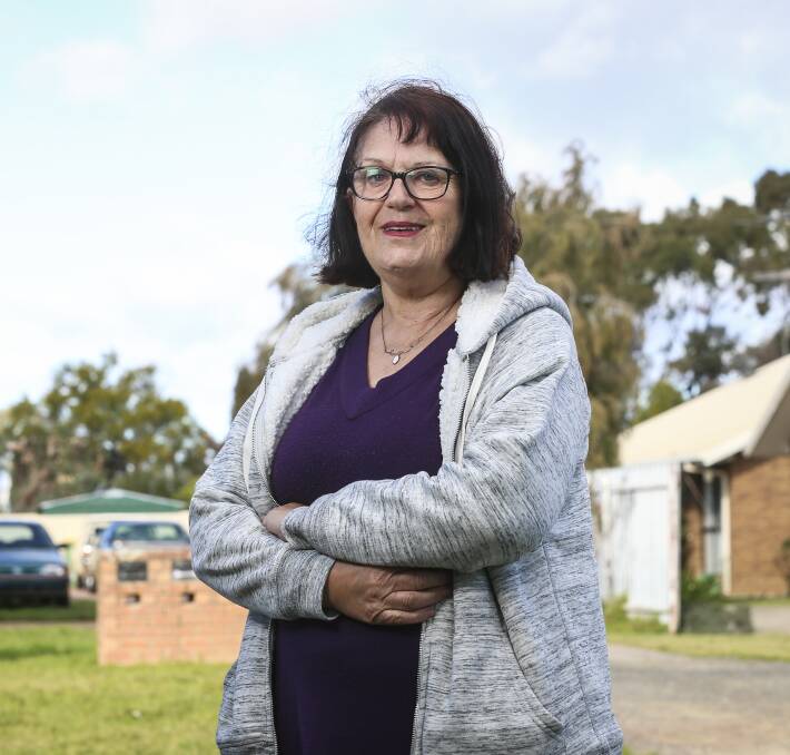 GROWING ANGER: Christine Curtis, of Mulwala, says her health and her finances are suffering because of an administrative battle to remove tenants."It's always going through my mind, I can't sleep," she says. Picture: JAMES WILTSHIRE