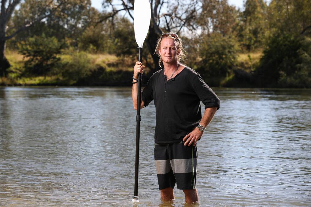 SETTING OFF: Brad McCabe at Albury's Noreuil Park in January before his canoe trip, which supported Beyond Blue. He arrived in Goolwa last week. Picture: MARK JESSER