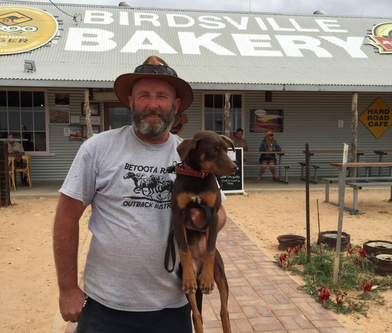 WE MADE IT: After a drive of nearly 2000kms, Barnawartha's Geoffrey Barter and his kelpie pup Grace are in Birdsville this week, ready to help out ahead of the remote Queensland town's annual race meeting, which starts on Friday.