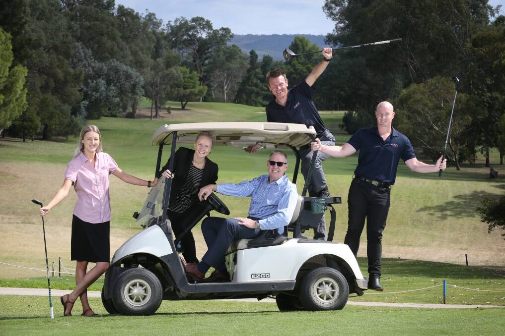 TEE TIME: Adroit's Bridget Martin, Olivia Hall, Michael Salter, Luke Pecotich and Ian Kay are keen to help Border Trust. Picture: KYLIE ESLER