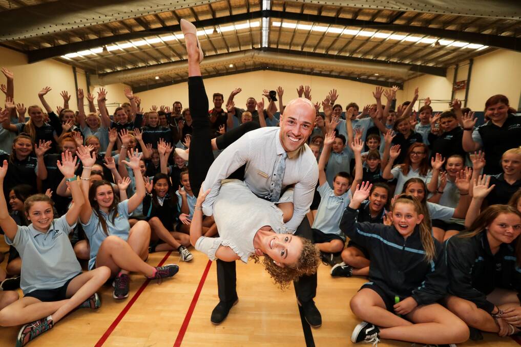 STAR TURN: Wodonga Middle Years College students get behind assistant principal Steven Fouracre and Paula Thompson. Picture: JAMES WILTSHIRE