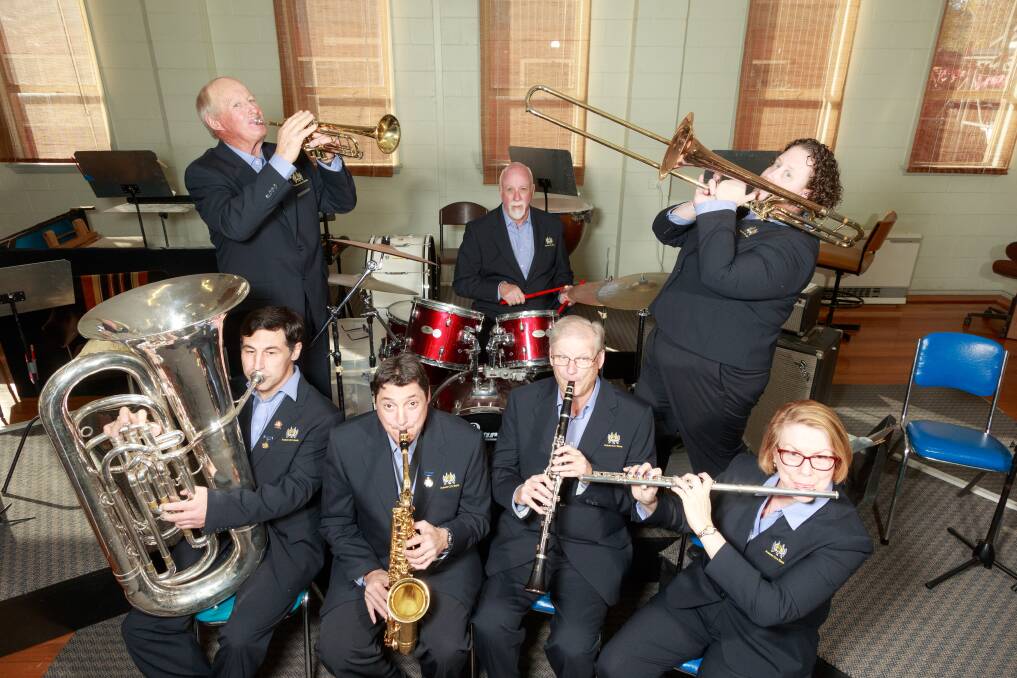 MAKING MUSIC: For 150 years, Albury City Band members have been serving their community and building their own family. Pictured are (clockwise from back left) Terry Cockayne (trumpet), John Carle (drums), Janine Shanahan (trombone), Lynne Moriarty (flute),  Graham Wright (clarinet),  Frank Sergi (alto saxophone) and Sean McDermott (tuba). Picture: SIMON BAYLISS
