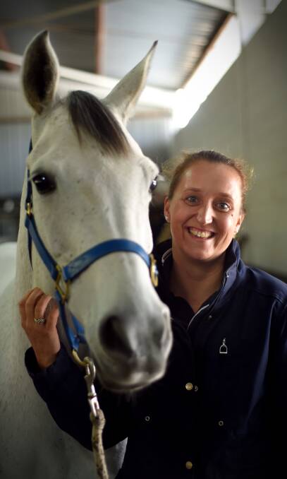 JOINT EFFORT: The achievement's taken longer than expected, but Oso Edith and her trainer Amanda Kettlewell will compete overseas in September. Picture: MARK JESSER
