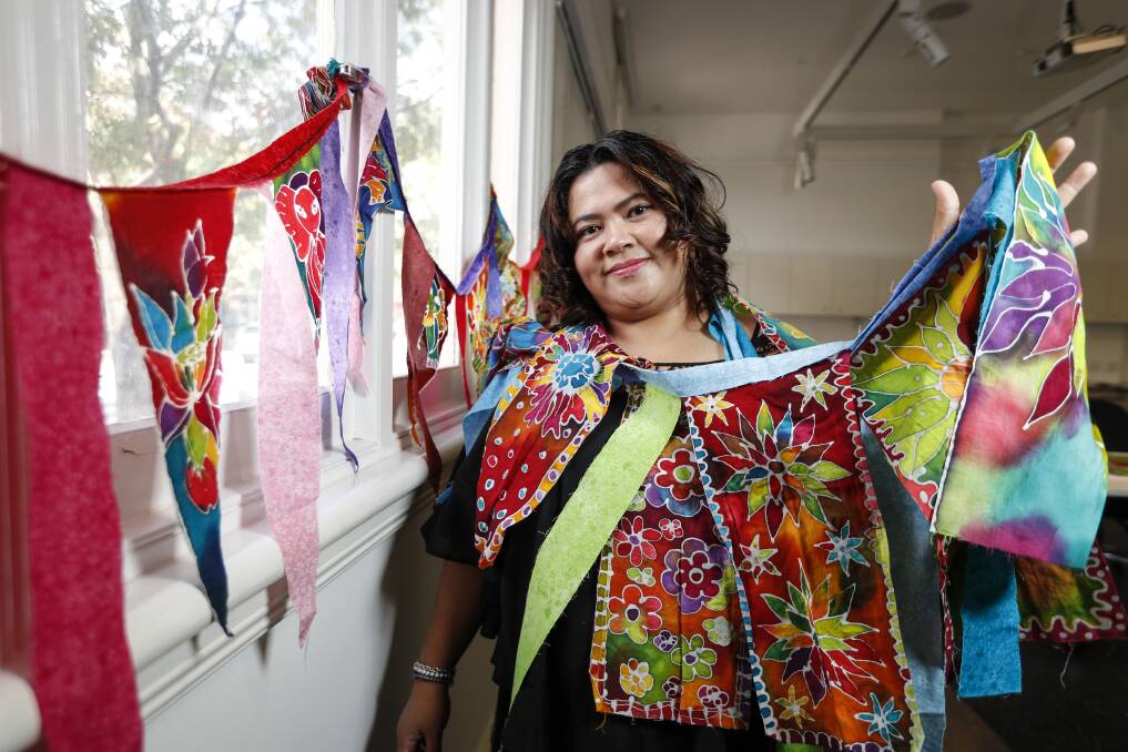 Albury artist Jinyapa Oupatham displays some of her batik works. Pictures: JAMES WILTSHIRE