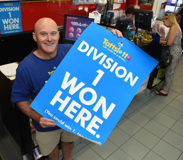 CHECK YOUR TICKET: Wodonga Plaza Cards and TattsLotto co-owner Tony Thorp is excited to have sold a winning Lotto ticket, the latest of 41 division one successes sold from the business over 28 years. Picture: MARK JESSER