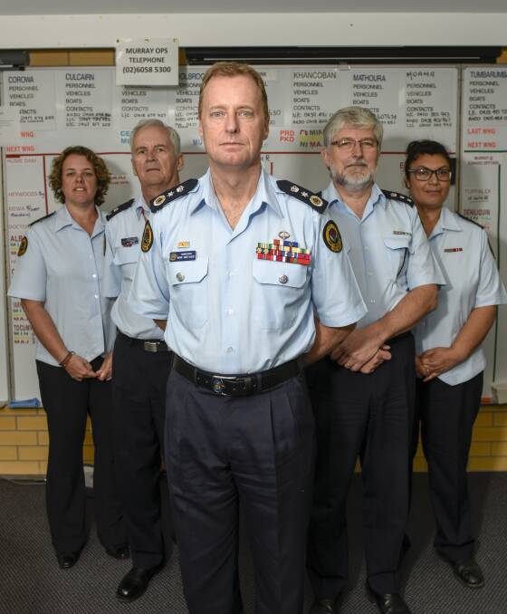 BORDER VISIT: NSW SES Commissioner Brigadier Mark Smethurst (front) with Murray region's Kathryn Hawke, Trevor Fribence, Bernard Kates and Shoshanna Griffin.