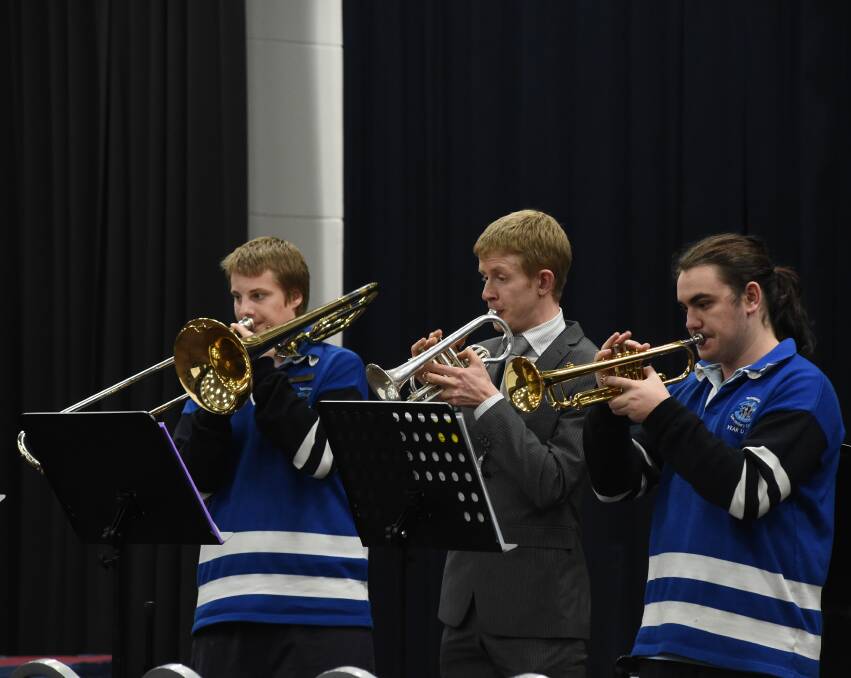 BRASSED OFF: In the Tallangatta Secondary College brass group are students Steven Howes and Lachlan McInerney, both 17, and teacher Rhys McKee (middle).