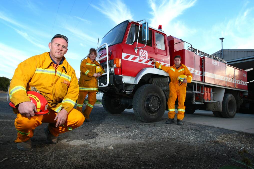 GRAVE CONCERNS: Kiewa Fire Brigade captain Aaron Wallace, pictured front, says community support is needed to enable the group to respond to daytime fire calls.