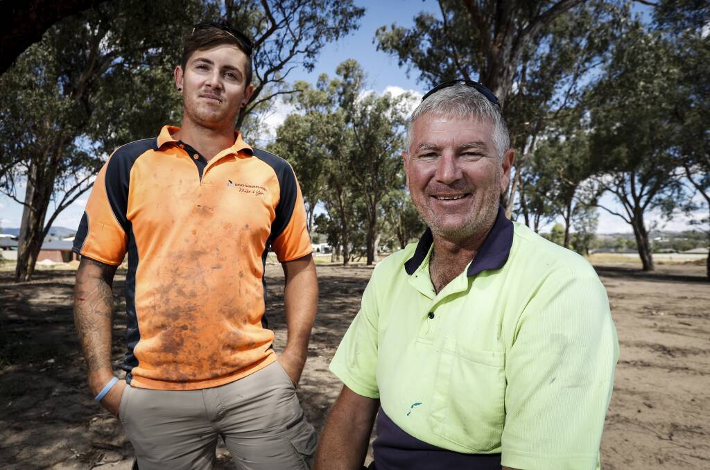 THANKFUL: Mitch and Peter Dempsey, Nick's brother and father, reflect on next month's Dip For Dempsey while in Wodonga on Monday. Picture: JAMES WILTSHIRE