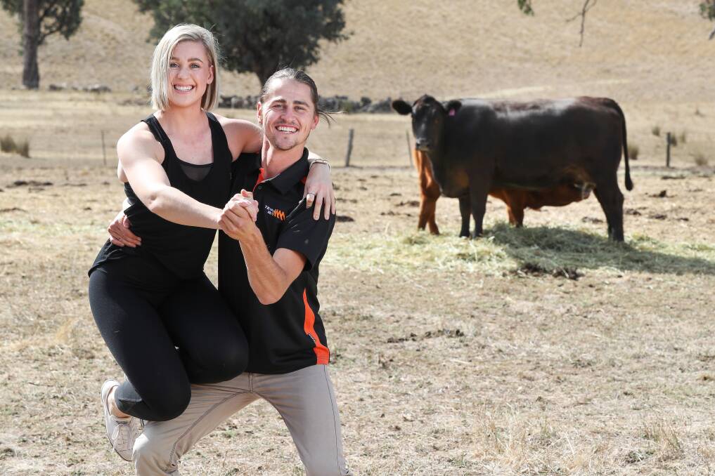 CASH COW: Maddi Bullock and Ryan Speed practise their moves for Stars of the Border Dance for Cancer. The couple will be auctioning a cow donated by Table Top's Graham Chapman to support their fundraising. Picture: MARK JESSER