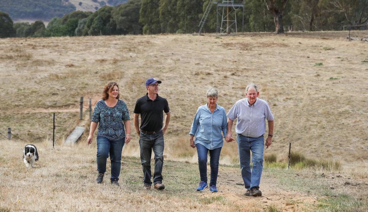 TRANSITION: Tanya and Brian McErlain walk with Merry and Peter Jeffrey near the Snowy River Camp flying fox. Picture: MARK JESSER