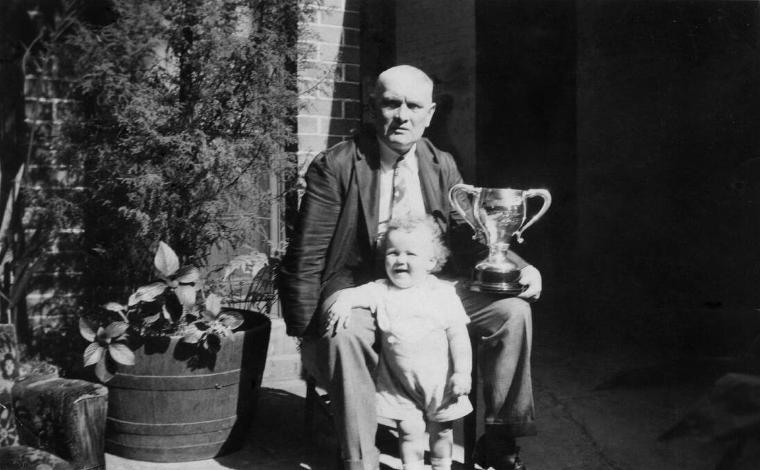 GIFT RECIPIENT: Arthur Telford, who with his wife Ada ran the hotel that briefly hosted the Uiver passengers and crew, holds the silver cup given to the couple.