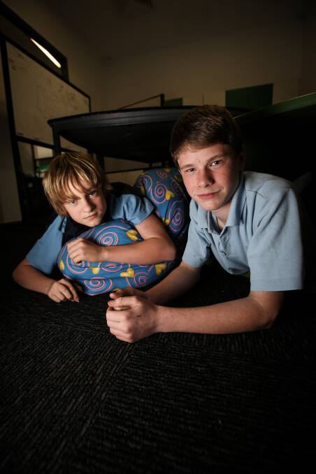 EYE OPENER: Wodonga Middle Years College year 8 students Alex Fitzsimmons, 13, and Tahi Davis, 14, realise not everyone on the Border can look forward to a warm bed in their own home at night. Picture: JAMES WILTSHIRE