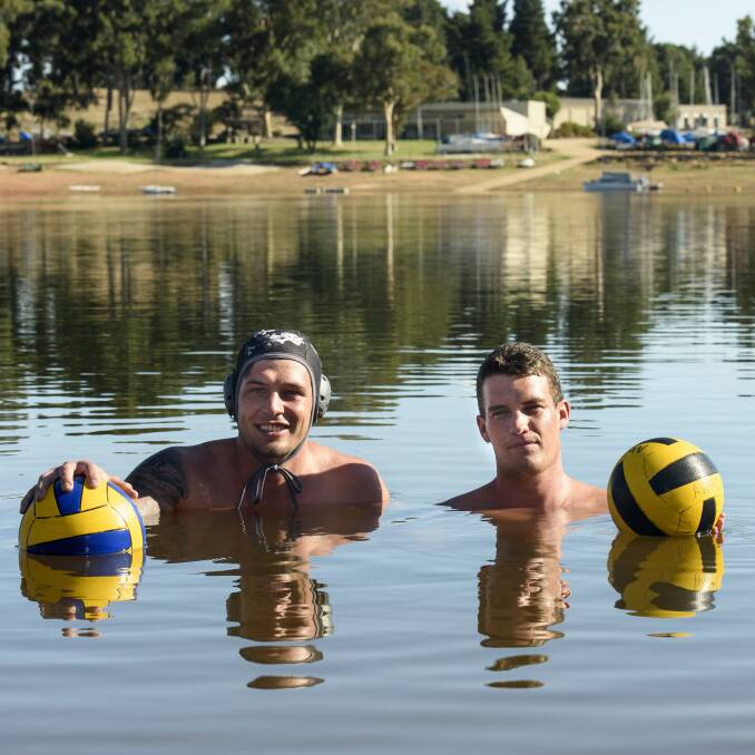 SOLIDARITY: Peter Fenney and Jack Baker will join many teammates at Friday's Dip for Dempsey. All swimmers in the open water event will need caps, with water polo players asked to wear their playing caps. Picture: SIMON BAYLISS