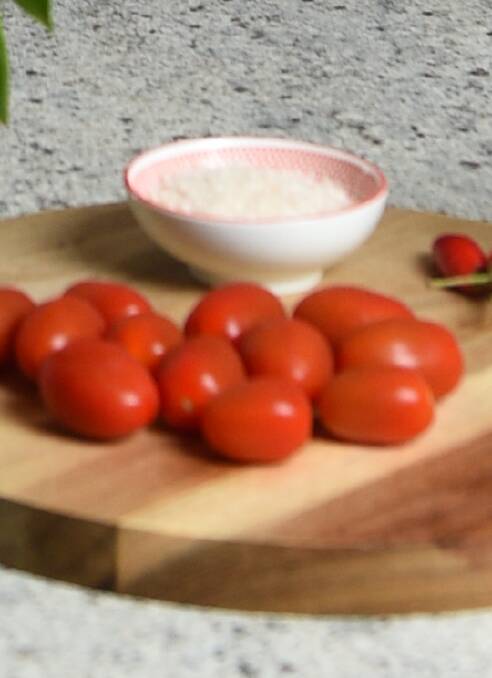 FRESH PRODUCE: Cherry tomatoes are key to the flavours of this dish.