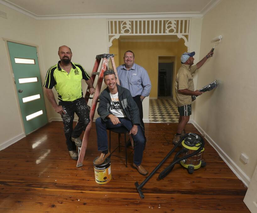 PRIME REAL ESTATE: Renovator Justin Stevens, co-owner Adam Coates and Harcourts Albury-Wodonga's Craig Huckel hope the community will get behind their goal to raise money for Carevan. Picture: ELENOR TEDENBORG