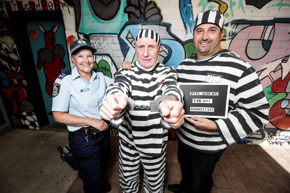 TIME 4 KIDS: Senior Constable Belinda Wells with Graham Chapman, of PRD Real Estate, and Pixel Accountants' Rad Sredojevic. Picture: JAMES WILTSHIRE