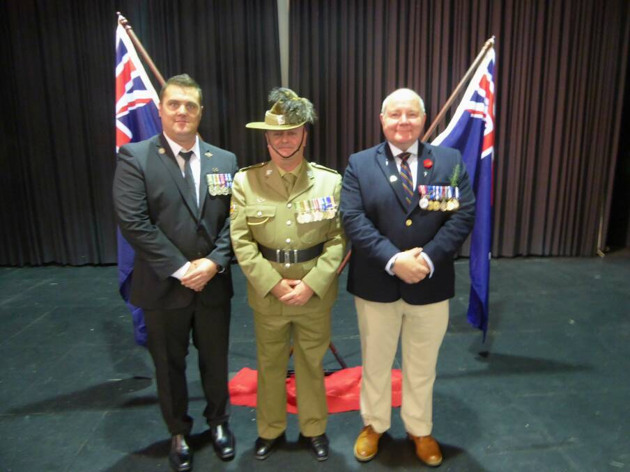 THEY WILL REMEMBER THEM: Guest speaker Warrant Officer Kevin Hopwood (centre) stands with Tallangatta organisers Rick Smith and Tony Elvidge. Picture: GRAEME ALDRICH