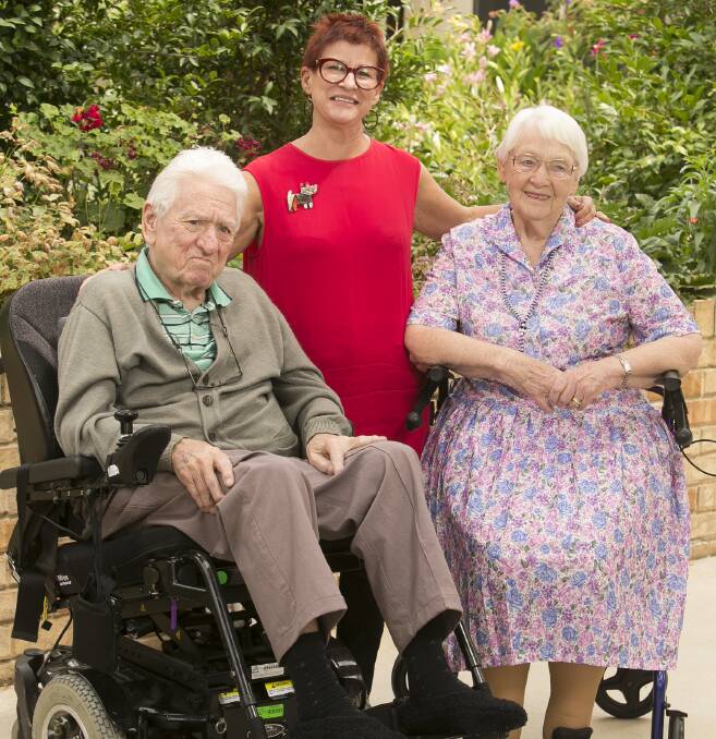 CARING COMMUNITY: Lutheran Aged Care Albury resident Gordon Osmond, chief executive Wendy Rocks and resident Florrie Thompson enjoy some peaceful time in the Dellacourt gardens. Picture: ELENOR TEDENBORG
