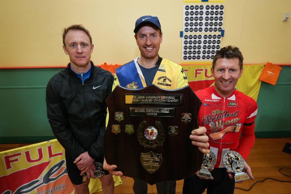 TOP THREE:  John Woodman Memorial Wagga to Albury Cycling Classic runner-up Brent Nichols, who also won the Culcairn sprint, winner Tony Crawford and third place and first local Ken Payne. Picture: JAMES WILTSHIRE