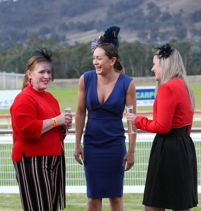 TIME TO MINGLE: Guest speaker Michelle Bridges (centre) chats with Cath Barry, of Killara, and Belvoir Special School acting principal Ebony Mitchell. Picture: KYLIE ESLER