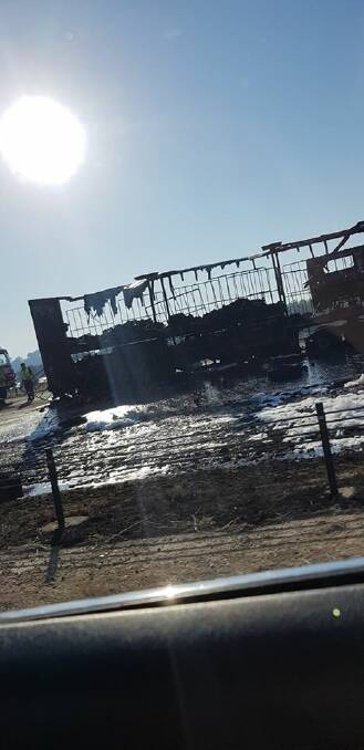 AFTERMATH: The burned-out shell of the B double trailer. Picture: SOPHIA AYLWARD