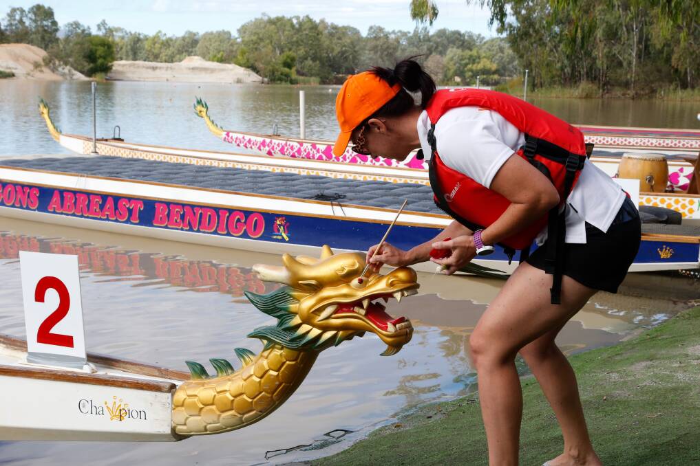 SYMBOLISM: "The eye dotting ceremony is to awaken the dragon to protect paddlers, the volunteers and spectators on a day like today,” participants heard at the opening.