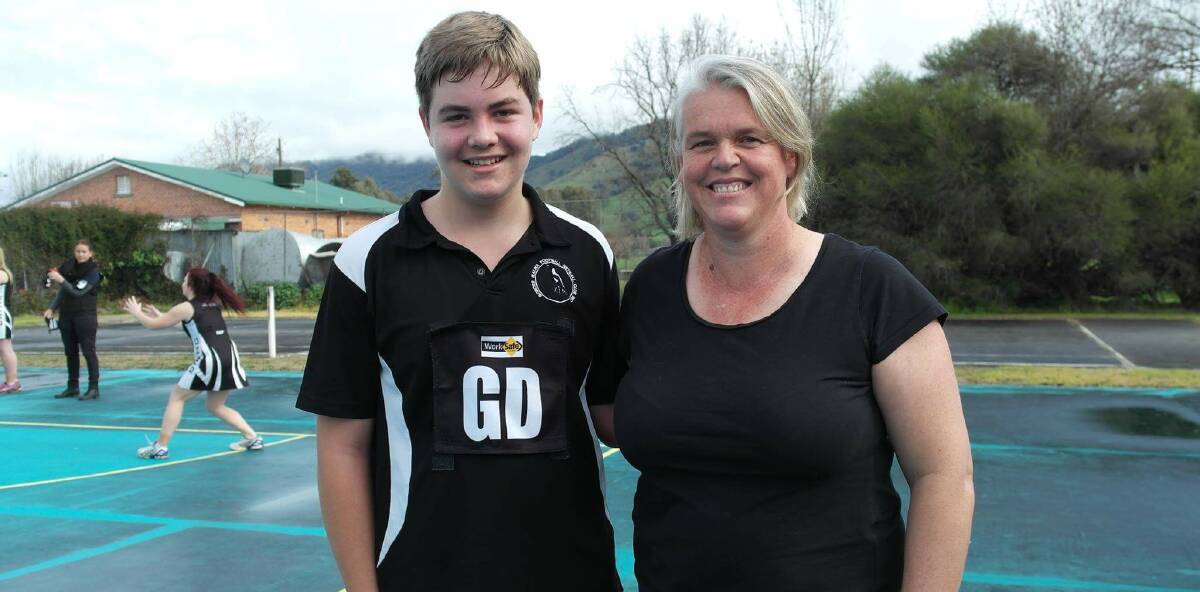 TEAM SUCCESS: Jared McKenzie and his coach Lou Coutts, who is also Border Walwa Football Netball Club president, have enjoyed this year's D grade competition.