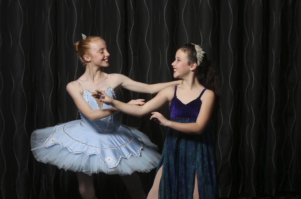 NEARLY TIME: Young dancers Sophie Dawson,11, of Albury, and Wirlinga's Rosie McCormack,10, prepare for the dnace competition. Pictures: ELENOR TEDENBORG