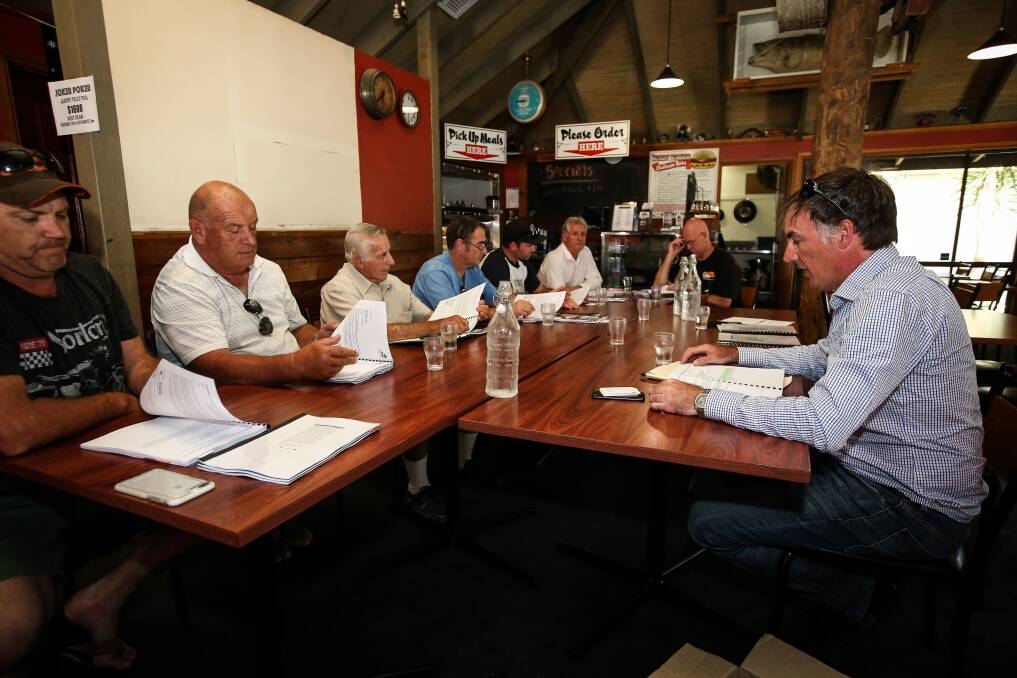 RESEARCH: Boating Industry Association of Victoria's Ben Scullin (right) talks through his briefing paper at Bundalong Tavern on Monday. Pictures: JAMES WILTSHIRE