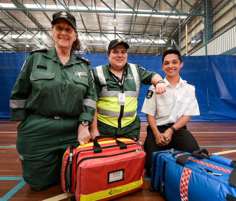 CREW ON CALL: Maureen Chesser, Lauren Germany and Ethan Vilaisarn, 13, were among the Wodonga St John Ambulance crews working on the weekend. The division attends nearly 200 events a year. Picture: MARK JESSER