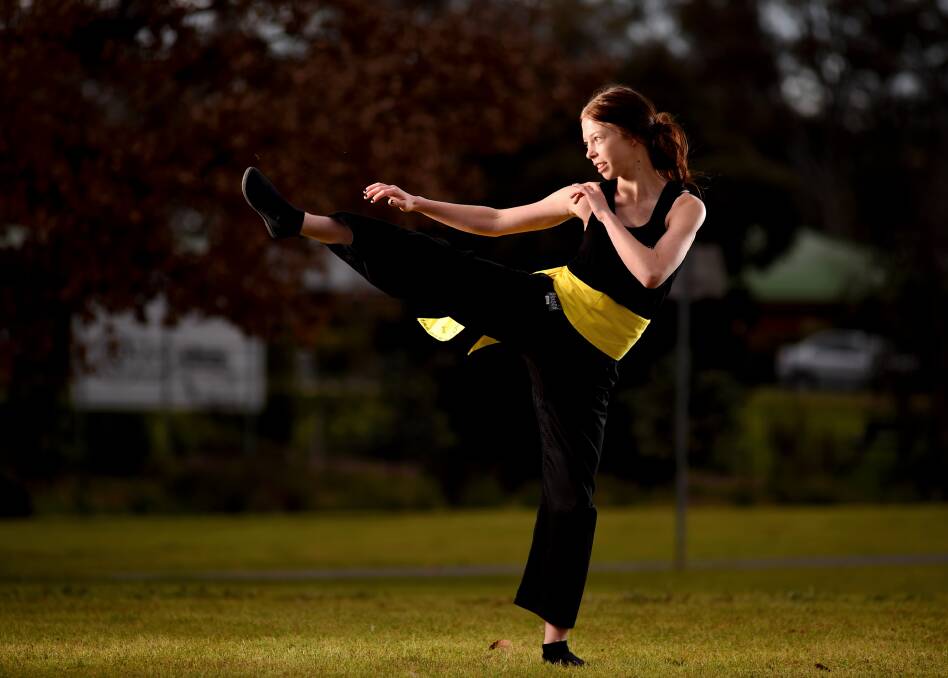 IN TRAINING: North Albury's Bree Johnson, 17, prepares for her public green ribbon grading before a visiting grand master. Picture: MARK JESSER
