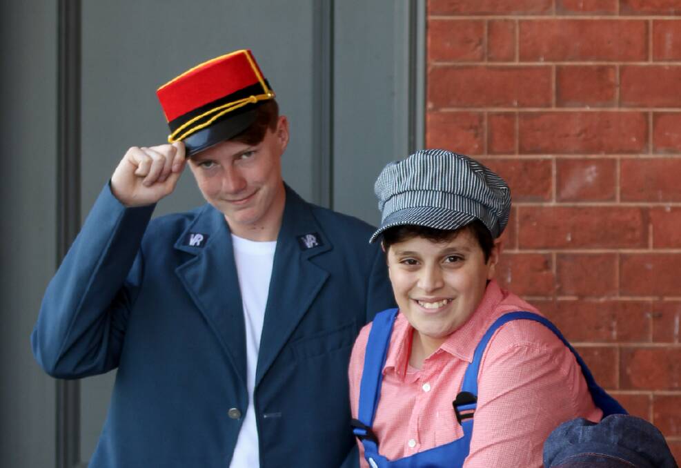 ALL ABOARD: Carey Baptist Grammar School middle school students Drew Lloyd and Alessio Russo join a cast of 53 to celebrate the characters and history of the Ovens Valley railway in eight free performances this weekend.