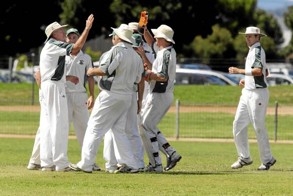 St Patrick’s players celebrate as Steve Williamson takes a catch to dismiss Ash Hockin yesterday at Alexandra Park. Picture: PETER MERKESTEYN