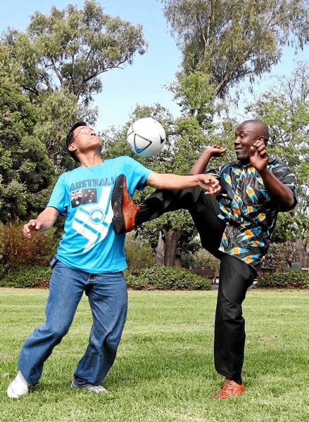 Damber Rai and Bahati Masudi prepare to face off in the Harmony Day soccer challenge at Hovell Tree Park tomorrow. Picture: BEN EYLES