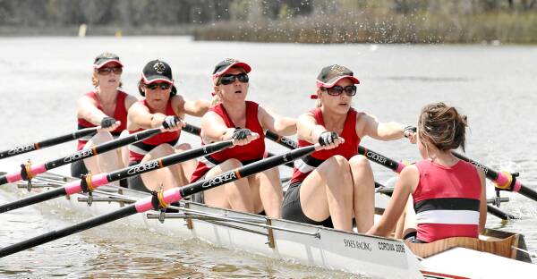 Corowa rowers Browyn Collins, Julie Underwood, Sally Maclean, Cherie Collins and Olivia Stones (cox) work their way to second in race 319 yesterday. Pictures: BEN Eyles