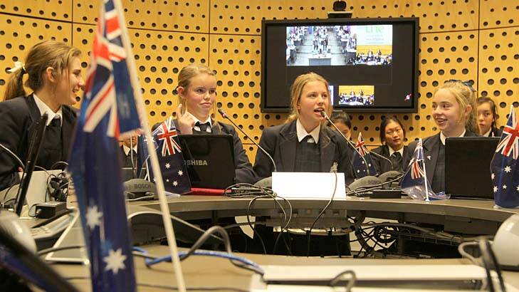 Crossing borders ... students from Pymble Ladies College use video conferencing to communicate with students in Korea.