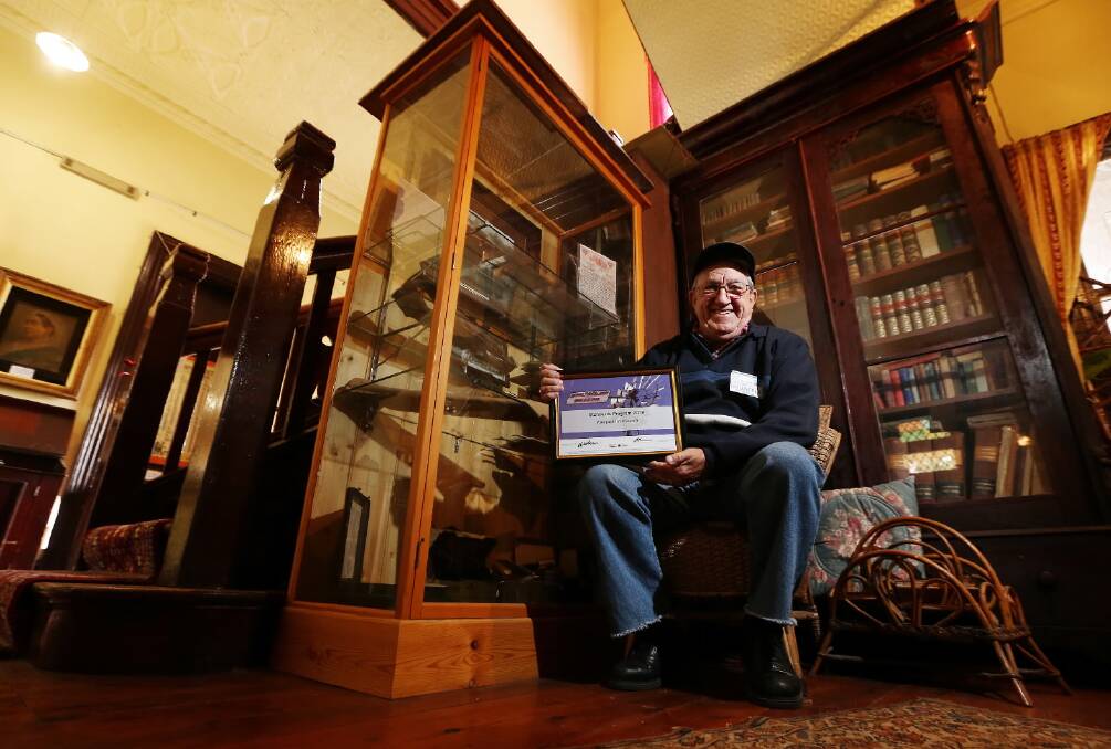 Holbrook’s Woolpack Inn Museum caretaker Bert Ray with the museum’s national standards certificate. Picture: JOHN RUSSELL