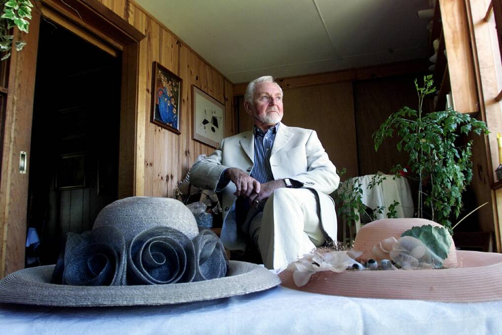 Milliner Freddie Fox at his sister’s house in Beechworth in 2000 with some of his hats.