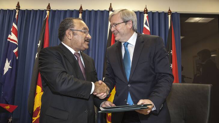 Papua New Guinea's Prime Minister, Peter O'Neill, and Australian counterpart  Kevin Rudd shake on their agreement over asylum seekers. Photo: Glenn Hunt