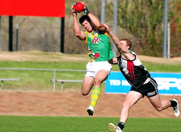 North Albury skipper Dan Leslie takes one of his 16 marks for the Hoppers in their win over Lavington on Saturday. Pictures: NIC GIBSON