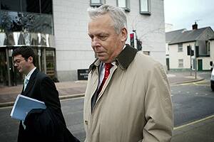 Philip de Figueiredo leaving Jersey Magistrate's Court after his first apperance in the wake of arrest and extradition application by Australian authorities.