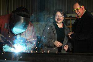 Welder Paul Denys hard at work with Sophie Mirabella and Clyde Hawkins. Picture: KYLIE GOLDSMITH