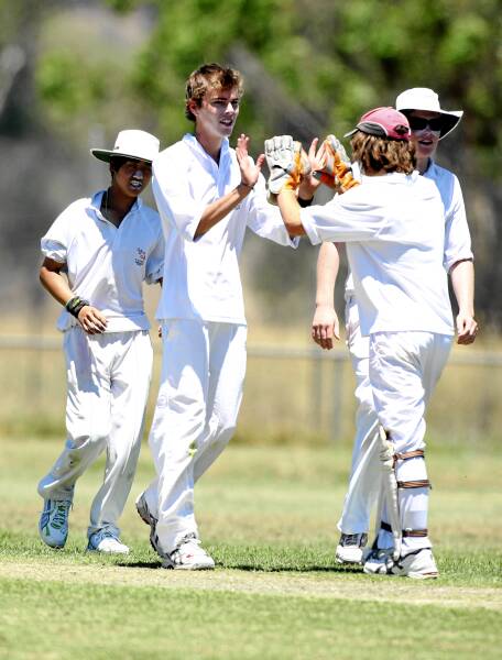 Off-spinner James Jewell bowls for CAW.