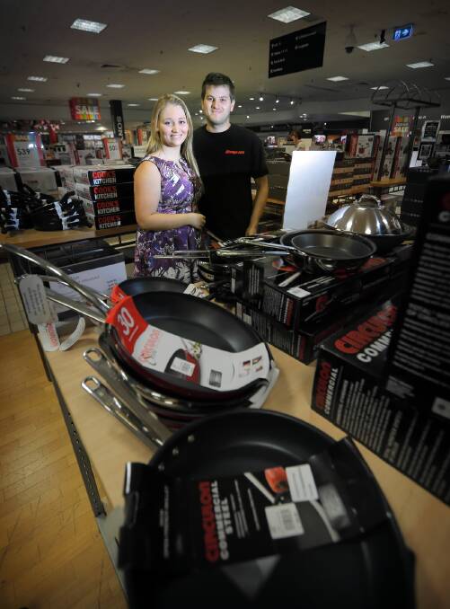 Ashleigh Righetti and Timothy Drysdale of Albury shopping for kitchenwares at the Myer Boxing Day sale yesterday. Picture: Tara Goonan
