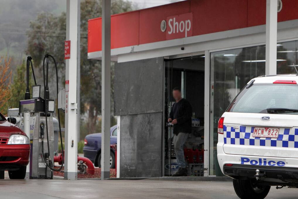 Police searched a Wodonga service station for clues after a ram raid yesterday morning.
