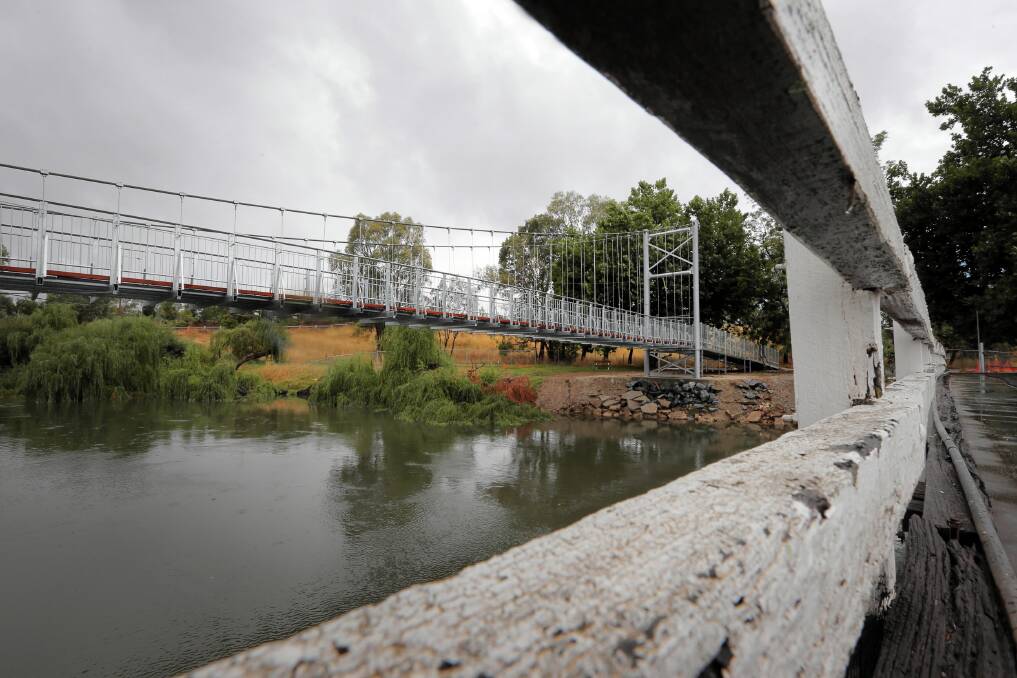 RIGHT: The view of the new cable suspension bridge from the old stock route bridge over Wodonga Creek. Picture: TARA GOONAN