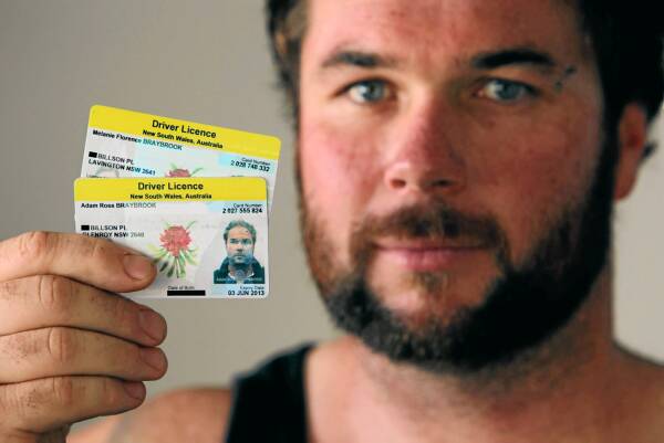 Adam Braybrook with his licence showing Glenroy and his wife’s showing Lavington.