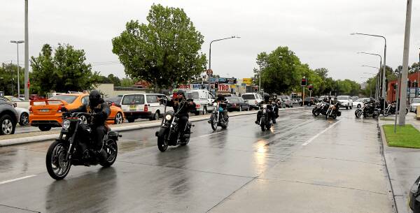 The Comancheros motorcycle gang, pictured on their national run through Albury last year, are expected to pass through Albury-Wodonga again today and tomorrow. Picture: PETER MERKESTEYN