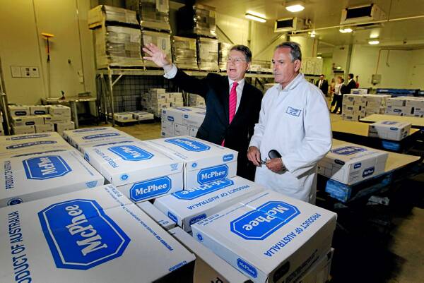 Minister for Major Projects Denis Napthine with Jon Hayes at the Wodonga abattoir. Picture: DAVID THORPE